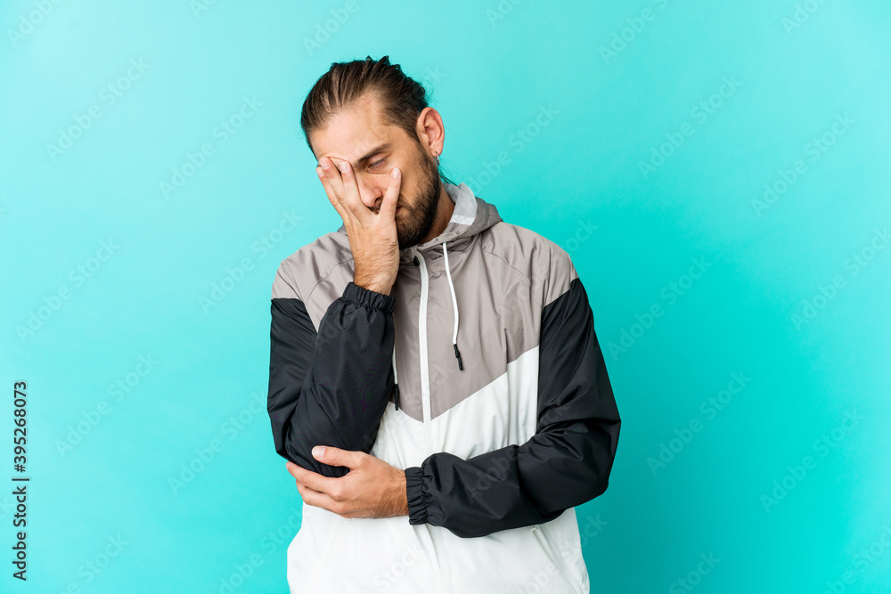 Young man with long hair look who is bored, fatigued and need a relax day. Young man with long hair look who is bored, fatigued and need a relax day.