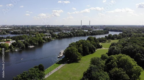 4k drone of treptower park berlin moving steadily left to right with allianz building river spree and else bridge photo