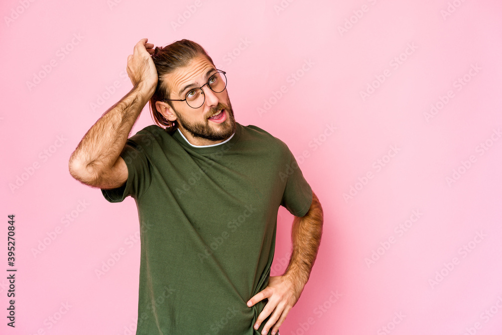 Young man with long hair look celebrating a victory, passion and enthusiasm, happy expression. Young man with long hair look celebrating a victory, passion and enthusiasm, happy expression.
