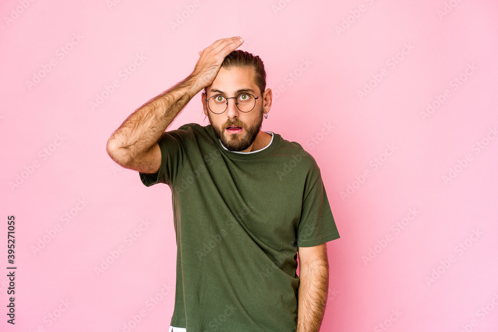 Young man with long hair look being shocked, she has remembered important meeting. Young man with long hair look being shocked, she has remembered important meeting.