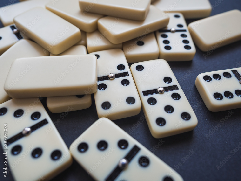 Domino background. Concept strategy. Domino pieces Domino background. Concept strategy. Domino pieces