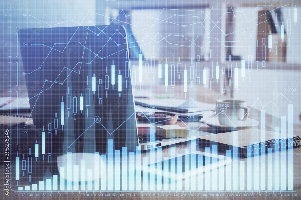 Multi exposure of forex graph and work space with computer. Concept of international online trading. Multi exposure of forex graph and work space with computer. Concept of international online trading.