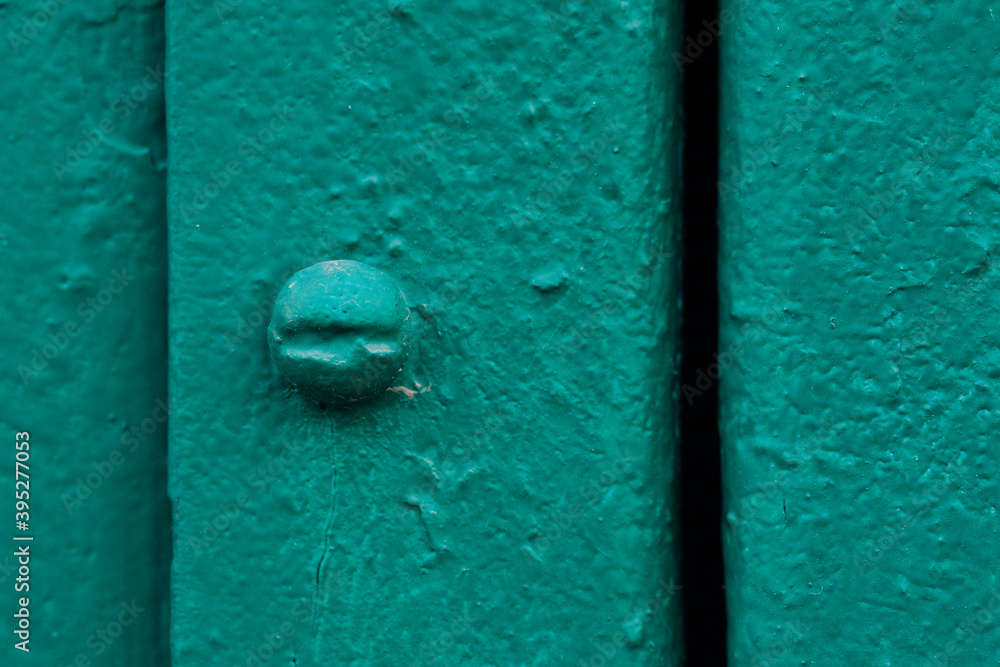 Background metal covered with green paint. Old grunge texture
