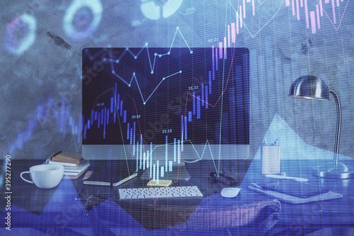 Double exposure of chart and financial info and work space with computer background. Concept of international online trading. © peshkova