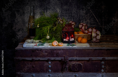 Christmas still life on a wooden chest. © TETYANA
