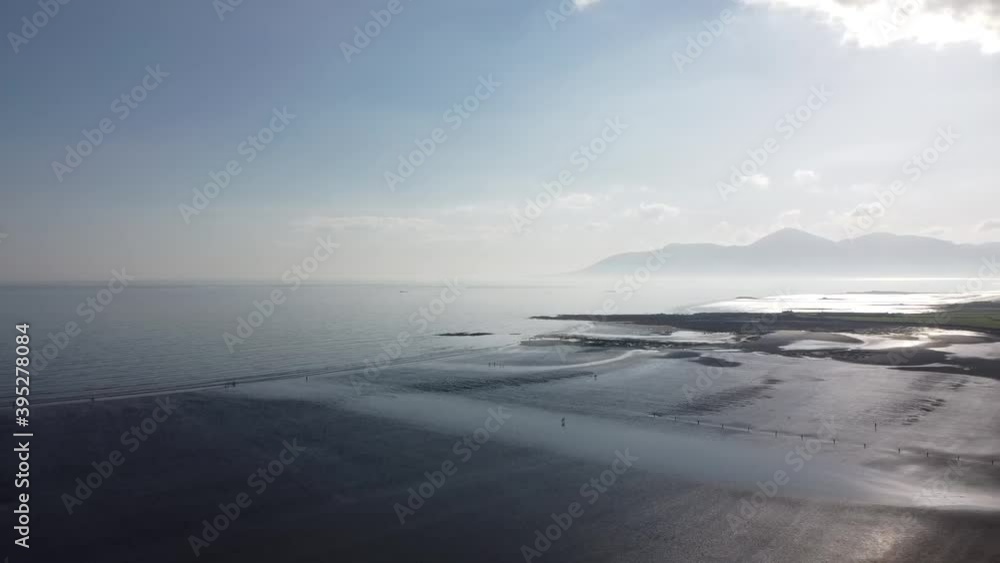 High Pan over Tyrella beach with Mourne Mountains in Background High Pan over Tyrella beach with Mourne Mountains in Background