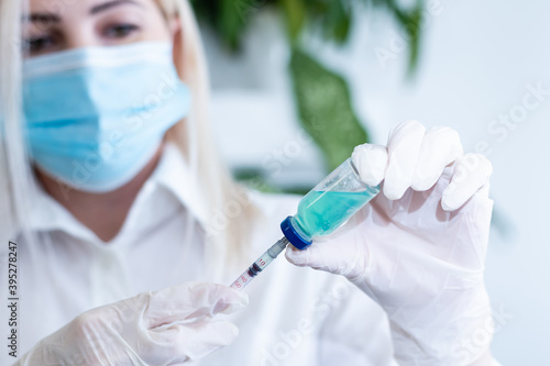 Obraz na płótnie Medical treatment vaccine and syringe for injections