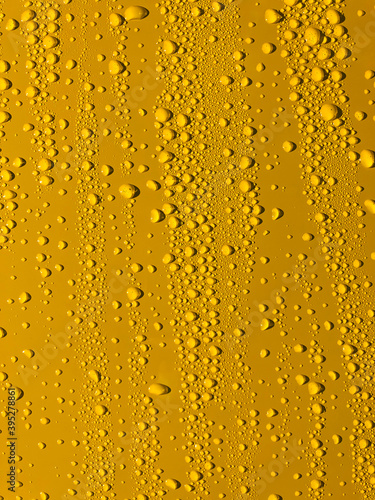 Yellow background with waterdrops