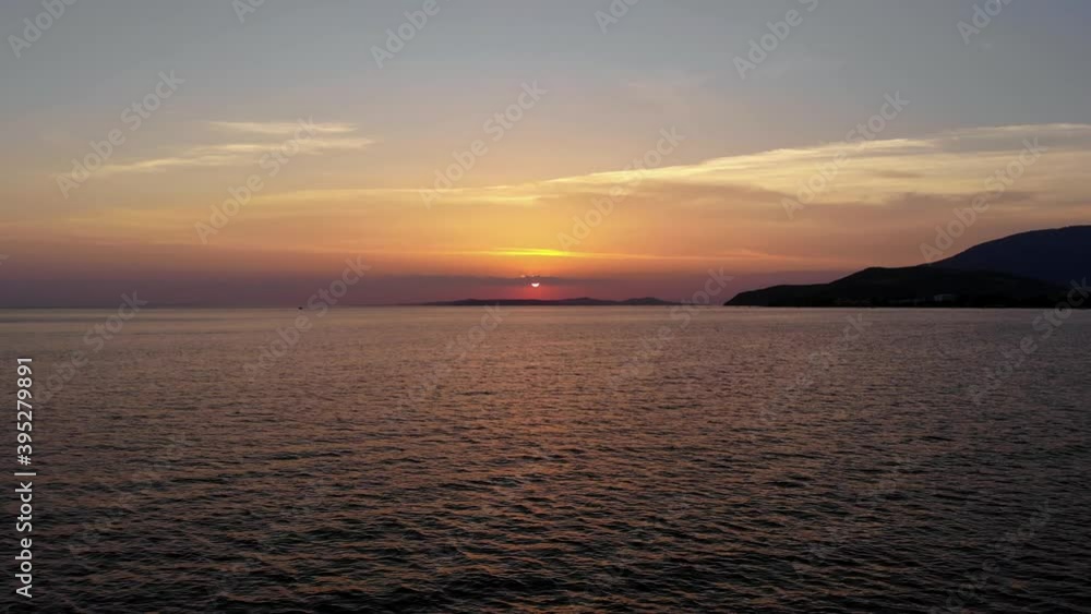 Aerial forward flight over Marmara sea at sunset when the sun behind the clouds, Turkey. Aerial forward flight over Marmara sea at sunset when the sun behind the clouds, Turkey.