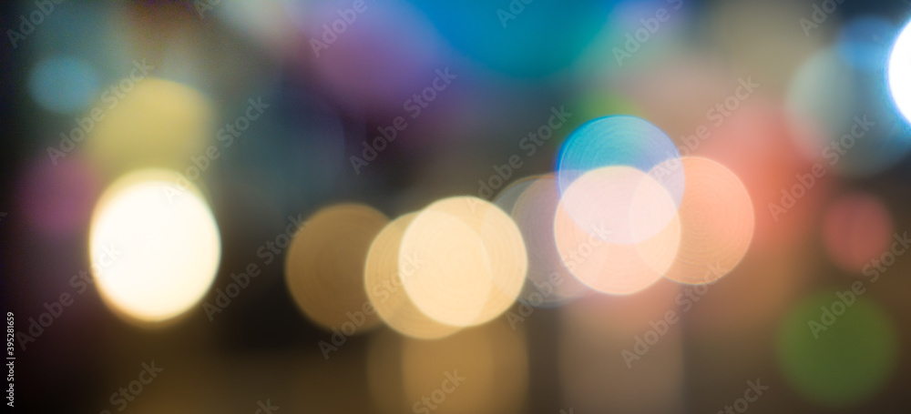 Fototapeta premium City blurring lights abstract bokeh on dark background