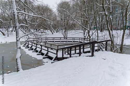 The recently frozen city pond. photo