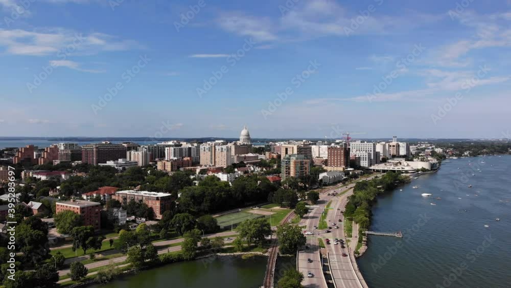 Aerial View of Madison, Wisconsin, USA. Cityscape Skyline and Traffic by Monona Lake on Sunny Summer Day Aerial View of Madison, Wisconsin, USA. Cityscape Skyline and Traffic by Monona Lake on Sunny Summer Day