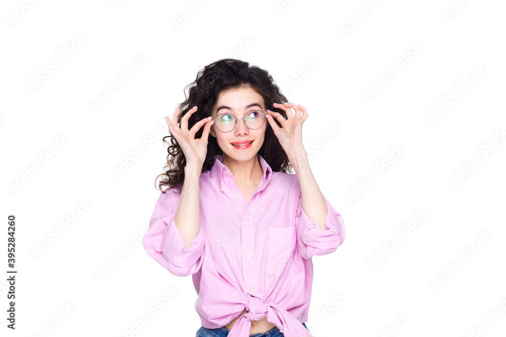 Image of an excited young Asian woman, standing isolated over white background. Information telling, shopping promotion, announcement, selling support concept Image of an excited young Asian woman, standing isolated over white background. Information telling, shopping promotion, announcement, selling support concept