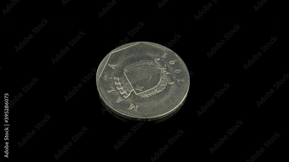 Malta 50 cents of Lira coin macro isolated shot, year 1991 Malta 50 cents of Lira coin macro isolated shot, year 1991