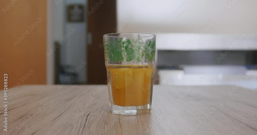 fill up a glas of juicy with sparkling water fill up a glas of juicy with sparkling water