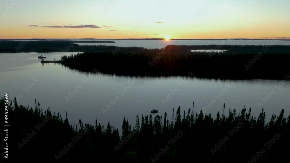 Drone flying down on a fishing boat with a beautiful sunset Drone flying down on a fishing boat with a beautiful sunset