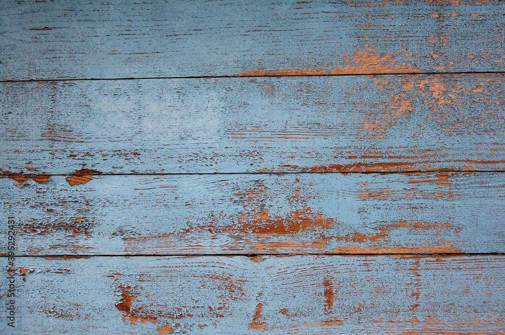 Natural wood background with peeling blue paint Natural wood background with peeling blue paint