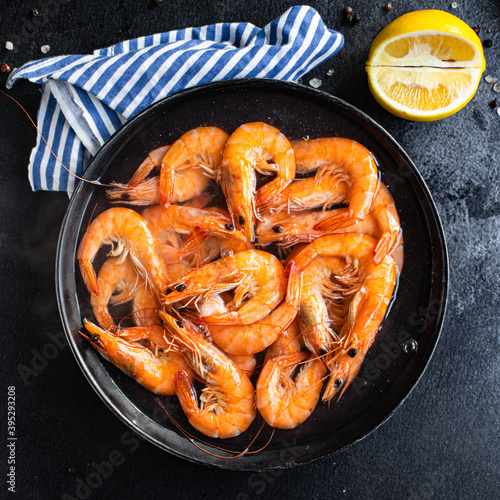 shrimp prawn seafood ready to eat cooked serving on a plate snack top view copy space for text food background rustic