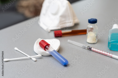 Medical treatment vaccine and syringe for injections on a white background. Prevention and treatment of coronary infection. Medicine is an infectious concept.