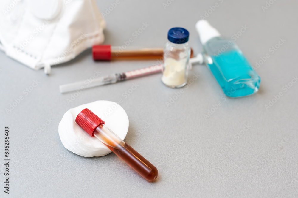 test tubes with vaccines on the table test tubes with vaccines on the table