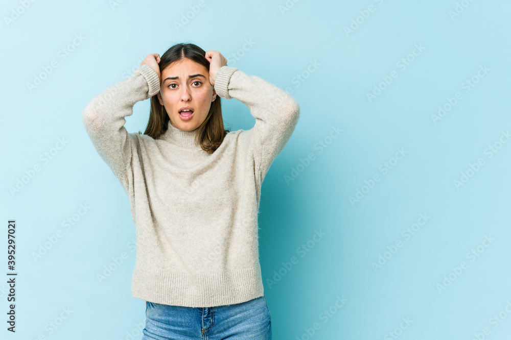 Young caucasian woman screaming with rage. Young caucasian woman screaming with rage.
