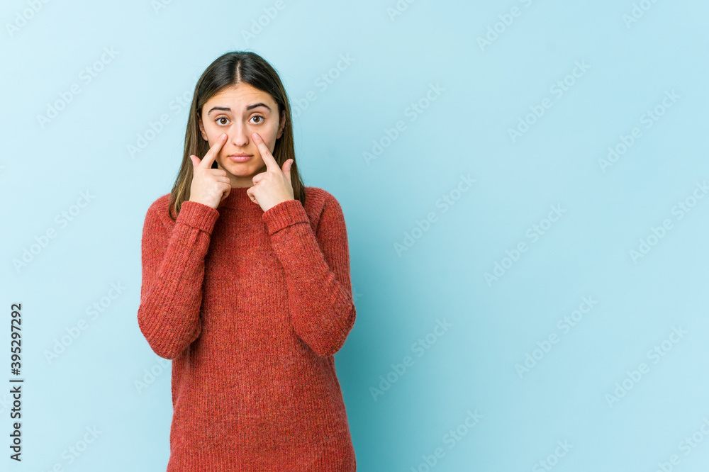 Young caucasian woman crying, unhappy with something, agony and confusion concept. Young caucasian woman crying, unhappy with something, agony and confusion concept.