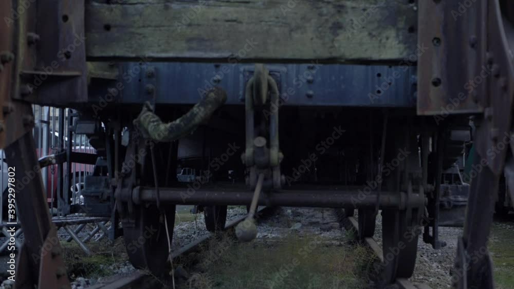 Stationary wooden cargo train carriage medium tilting shot Stationary wooden cargo train carriage medium tilting shot