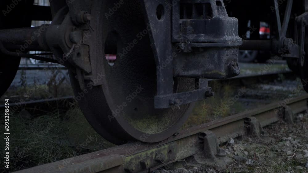 Train wheel on the track close up low panning shot Train wheel on the track close up low panning shot