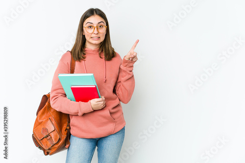 Young caucasian student woman isolated on white background