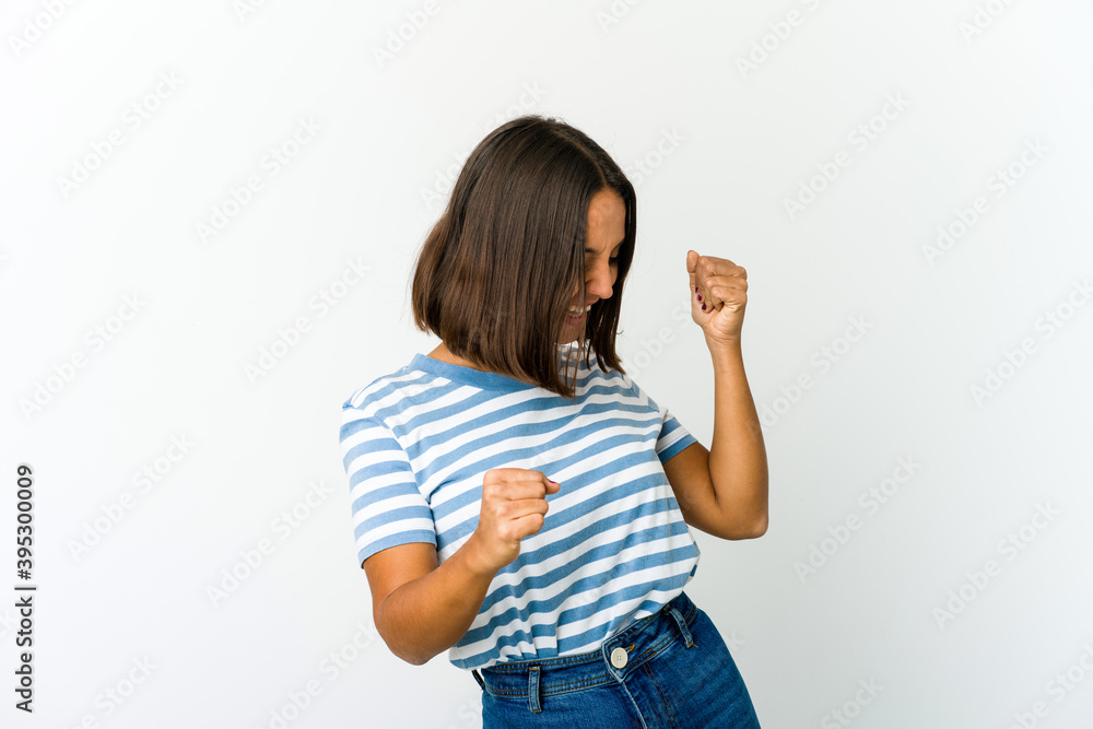 Young mixed race woman dancing and having fun. Young mixed race woman dancing and having fun.