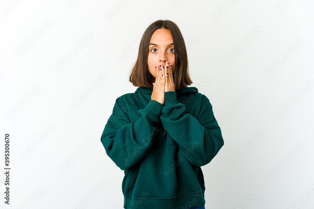 Young mixed race woman shocked covering mouth with hands. Young mixed race woman shocked covering mouth with hands.