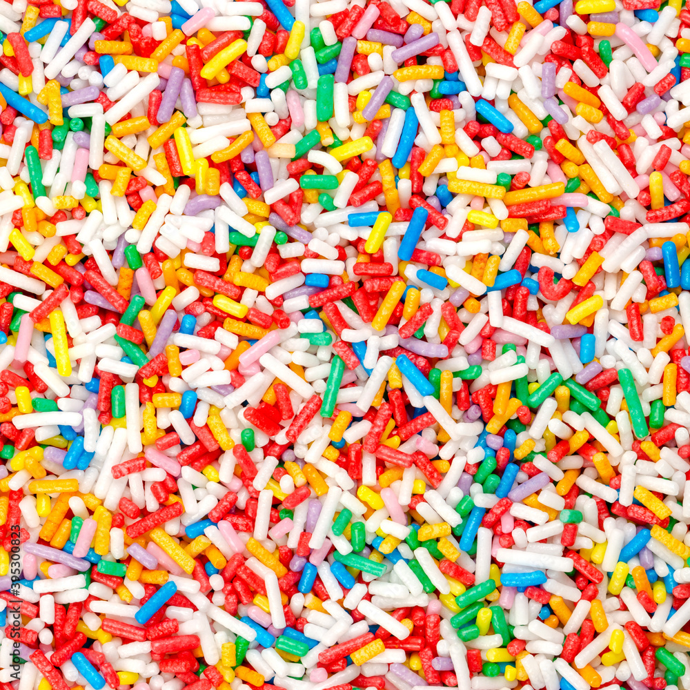 Rainbow sprinkles, square shaped background and surface. Rod-shaped  colorful sugar sprinkles. Tiny candies in a variety of colors, used as  decoration or topping. Backdrop. Macro food photo from above. Stock-Foto |  Adobe