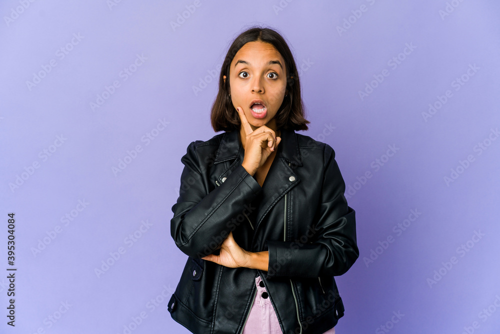 Young mixed race woman having some great idea, concept of creativity. Young mixed race woman having some great idea, concept of creativity.