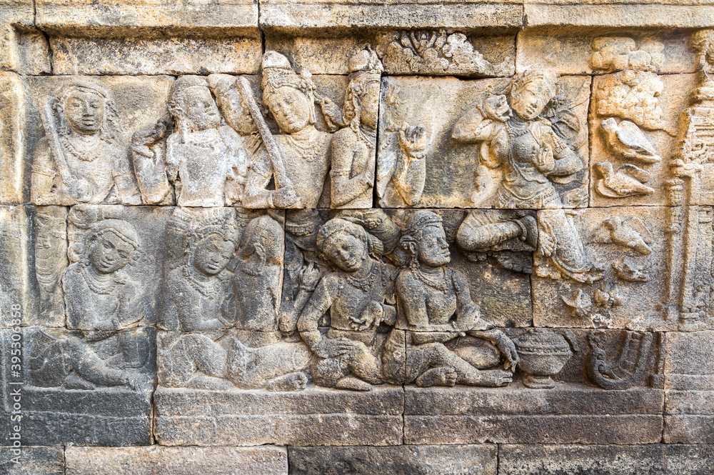 Bas-relief statue at Borobudur, a 9th-century Mahayana Buddhist temple in Central Java Bas-relief statue at Borobudur, a 9th-century Mahayana Buddhist temple in Central Java