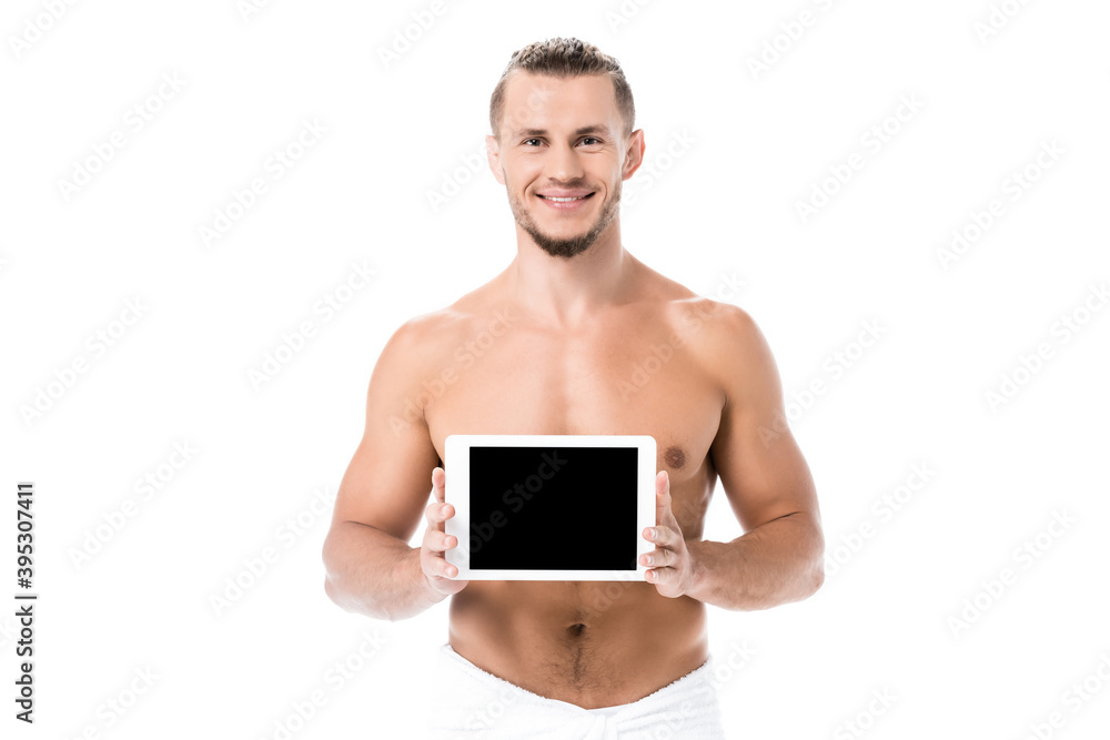 sexy shirtless man in towel presenting digital tablet isolated on white sexy shirtless man in towel presenting digital tablet isolated on white