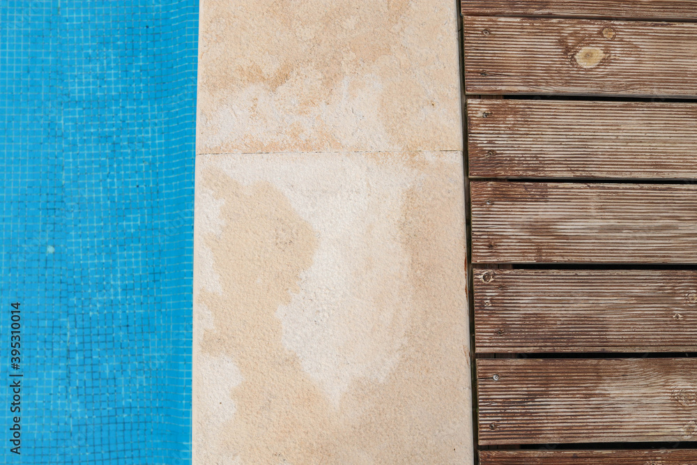Fototapeta premium The planking of a swimming pool and it's edge