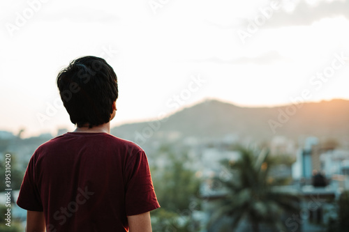 Portrait of an Indian man looking at the sunset