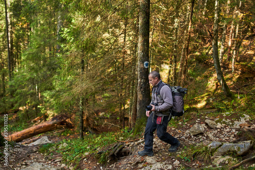 Professional nature photographer hiking