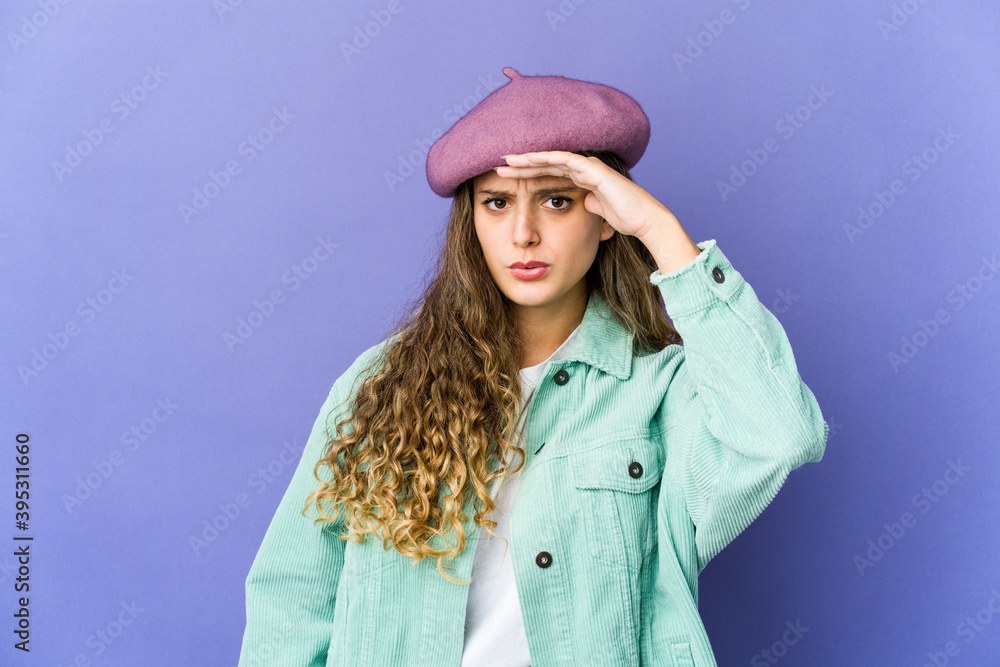 Young caucasian cute woman touching temples and having headache. Young caucasian cute woman touching temples and having headache.