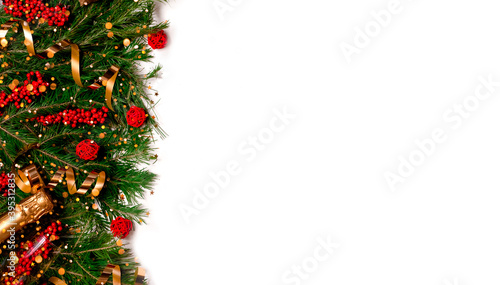 Festive New Year background. Christmas and New Year decorations fir tree and bokeh lights. Top horizontal view copyspace