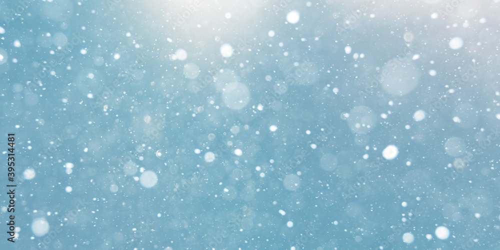 winter snow fall bokeh on blue background.
snow flakes. winter snow fall bokeh on blue background.
snow flakes.
