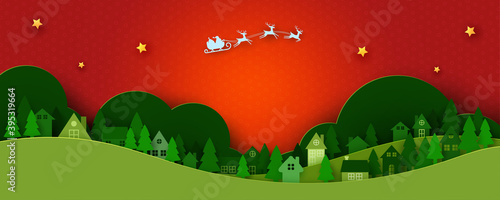 Merry Christmas and Happy New Year.Winter season landscape background.Santa Claus in sleigh and urban countryside.