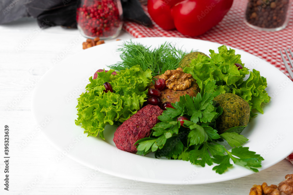 Traditional Georgian dish appetizer Phali served with salad leaves Traditional Georgian dish appetizer Phali served with salad leaves