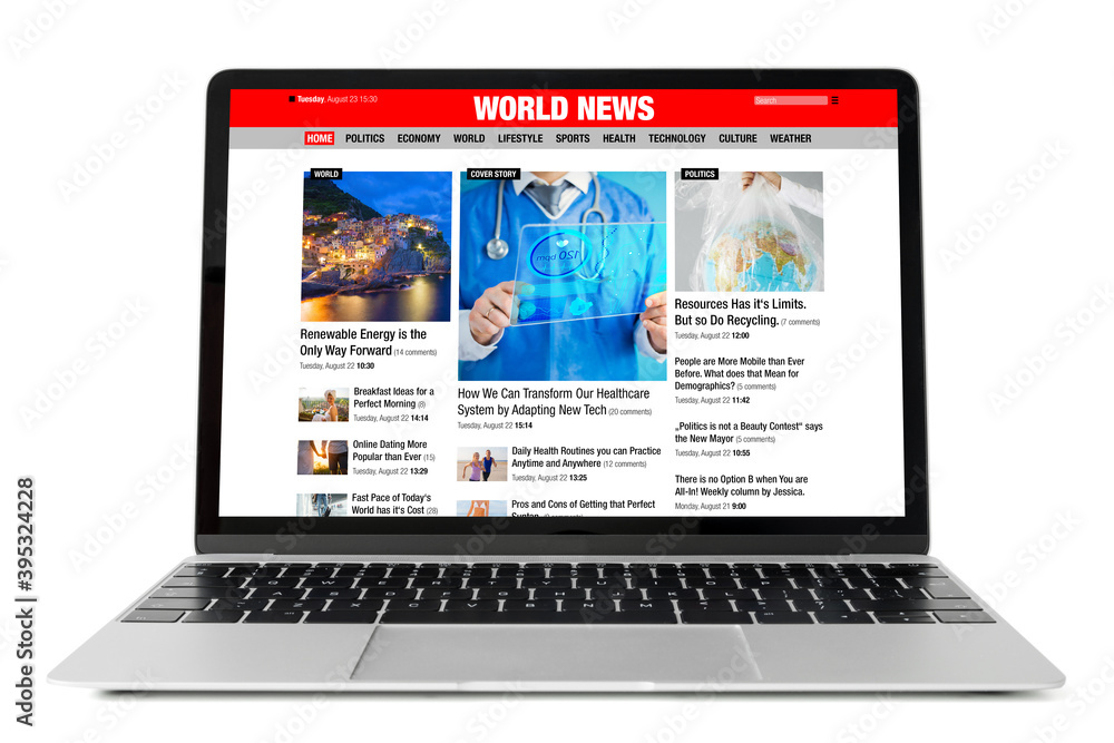 Sample news website shown on laptop computer Sample news website shown on laptop computer