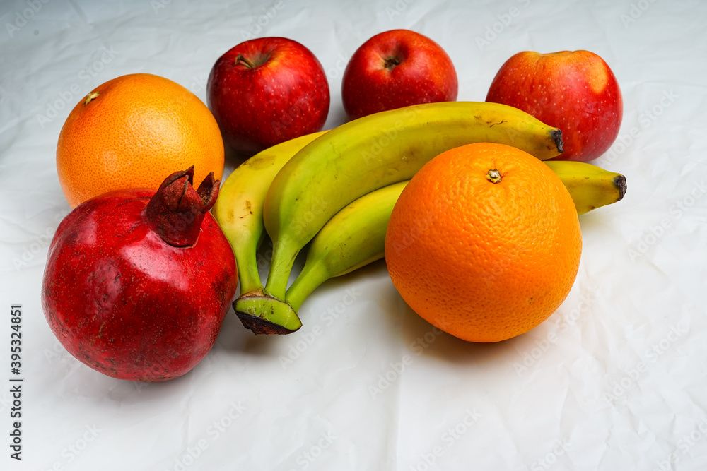 composition of fruits on white paper background
composition of fruits on white paper background