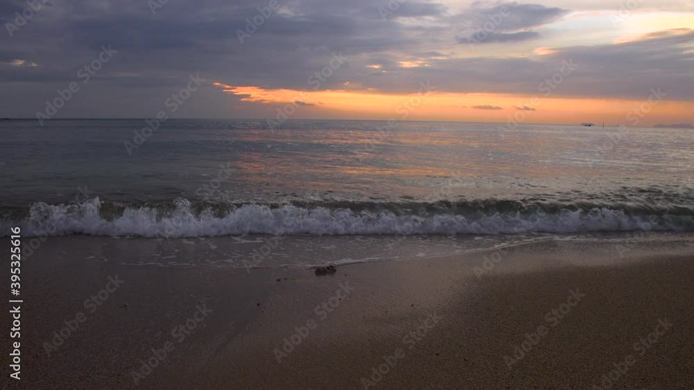beautiful sun setting over tropical beach beautiful sun setting over tropical beach