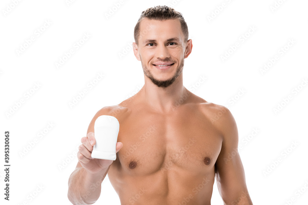 smiling shirtless man with deodorant isolated on white smiling shirtless man with deodorant isolated on white