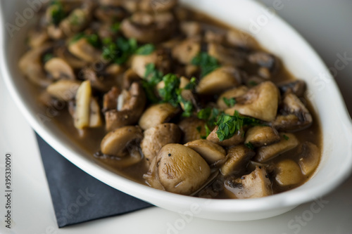 Mushrooms roasted in garlic, onions, olive oil and fresh herbs and spices. Classic American steakhouse or French bistro appetizer or side dish.