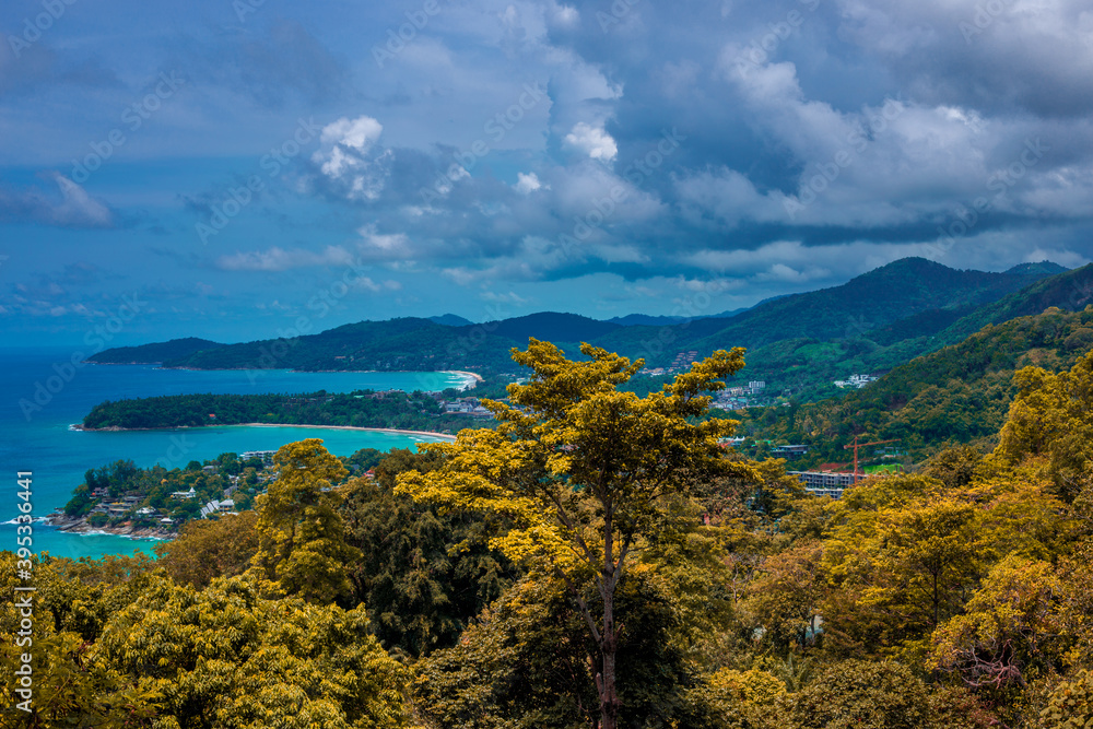 Natural background of seaside scenery (with coconut trees, boulders, sandy beach) and blurred sea waves. Natural background of seaside scenery (with coconut trees, boulders, sandy beach) and blurred sea waves.