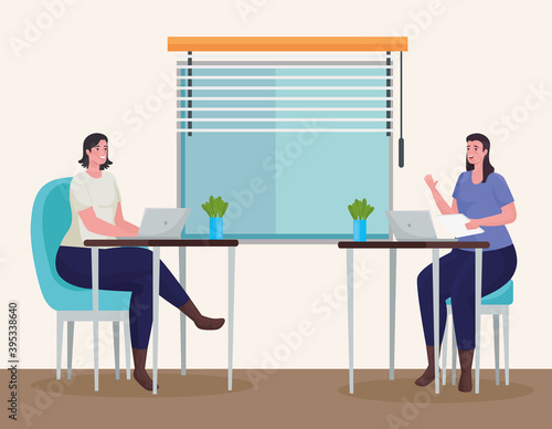 women couple using laptops for meeting online in the workplace vector illustration design